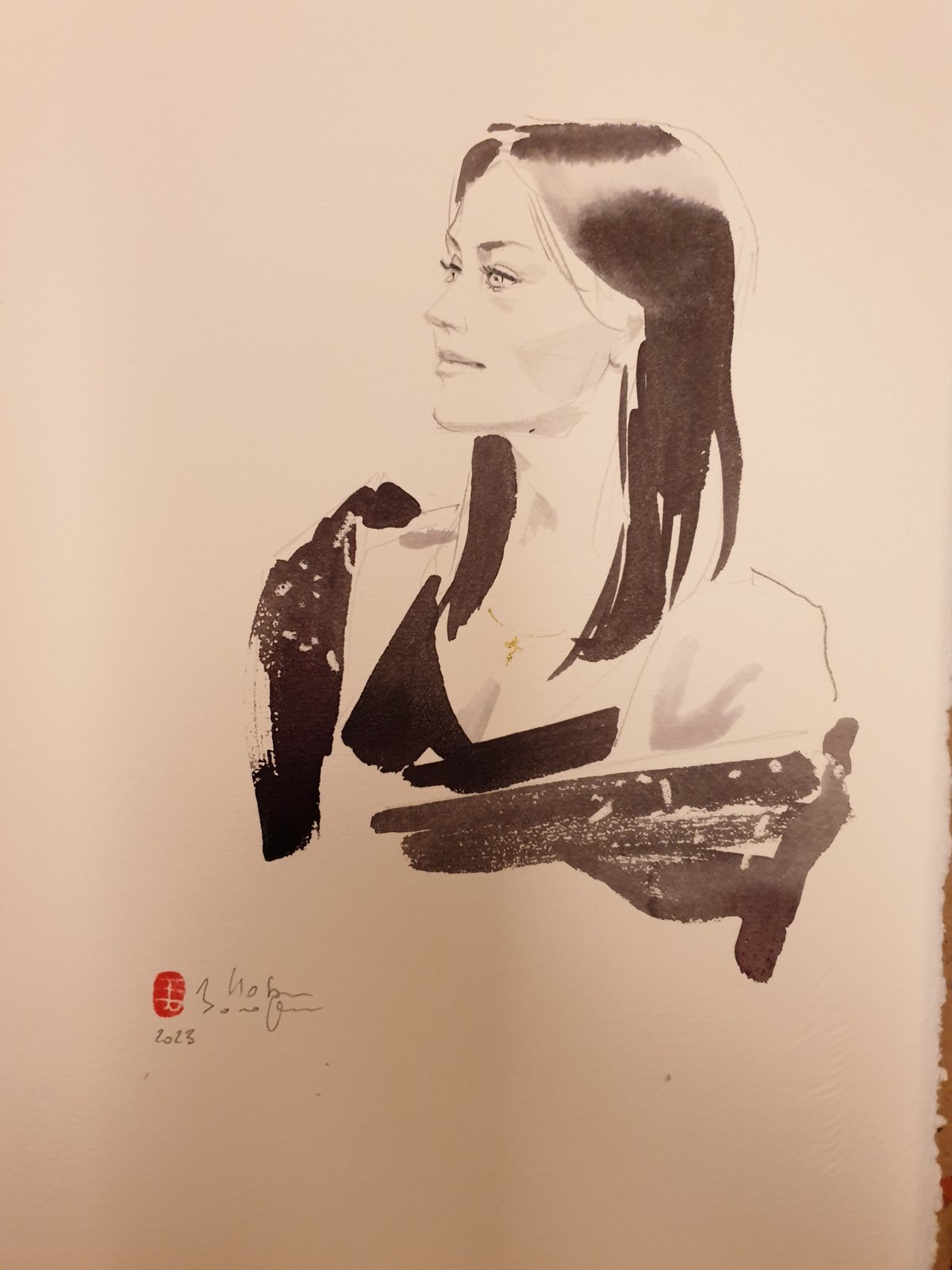Portrait à l'encre réalisé en direct pour Van Cleef & Arpels à Genève