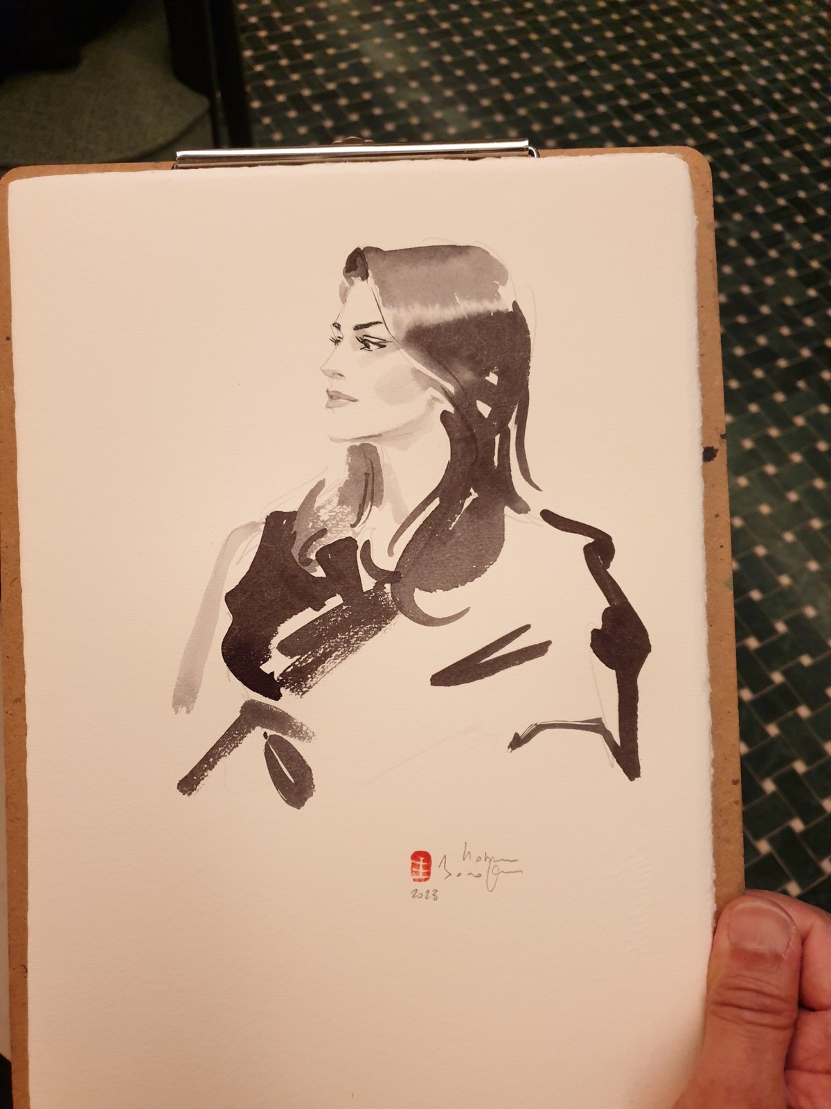 Portrait à l'encre réalisé en direct pour Van Cleef & Arpels à Genève